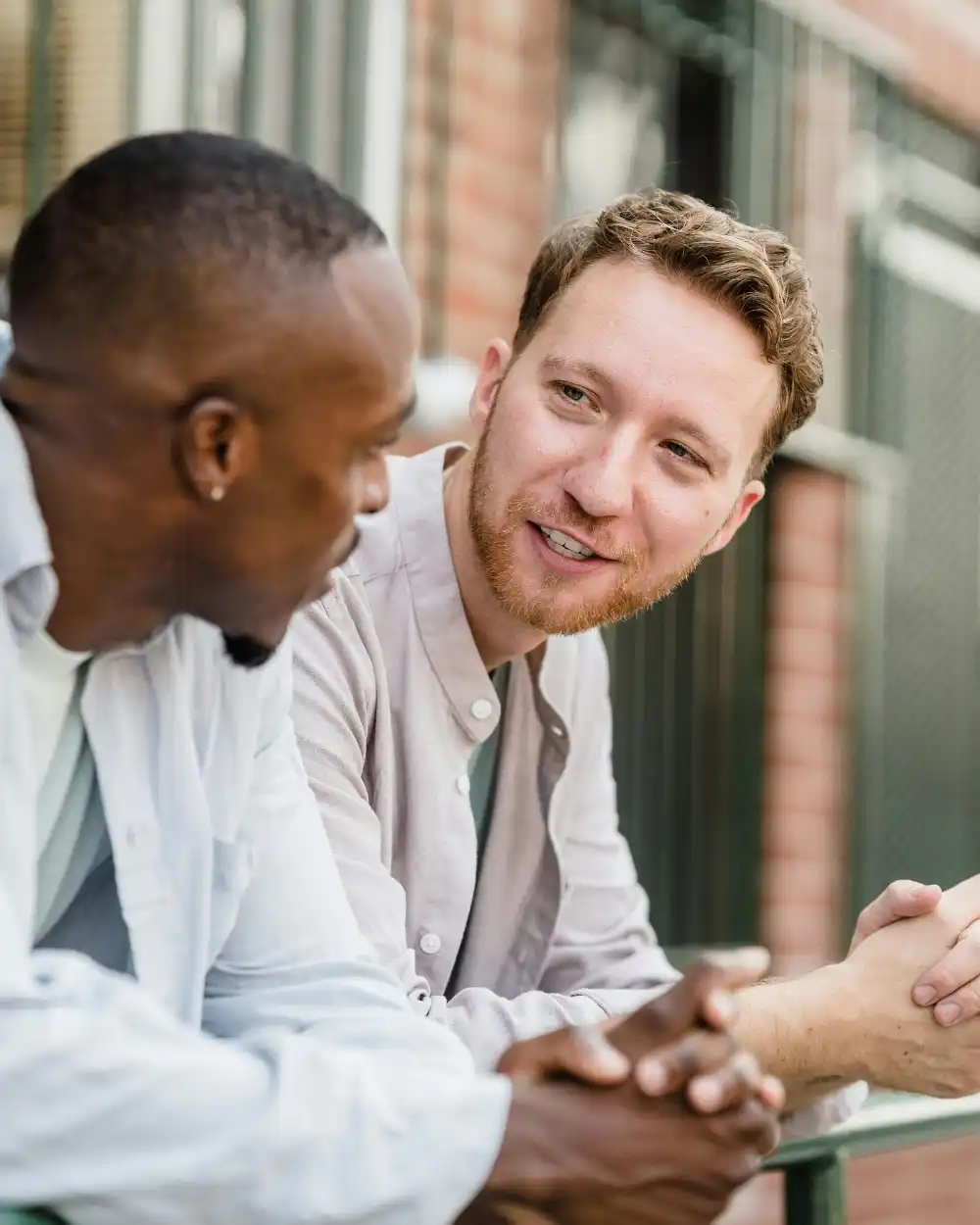 Two men in conversation.